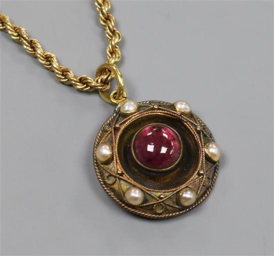 A Victorian yellow metal, en tremblant cabochon garnet and split pearl set circular pendant, on a lter 9ct gold chain, pendant 17mm.